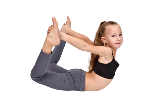 Girl in yoga pose wearing gray leggings and black crop top.