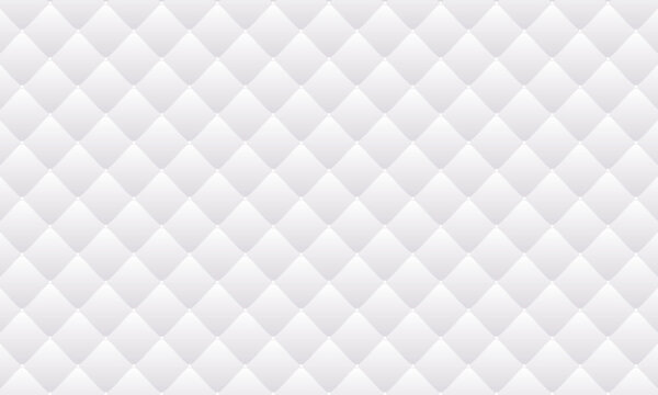 ボタンの装飾があるふんわりした白いキルトの背景素材