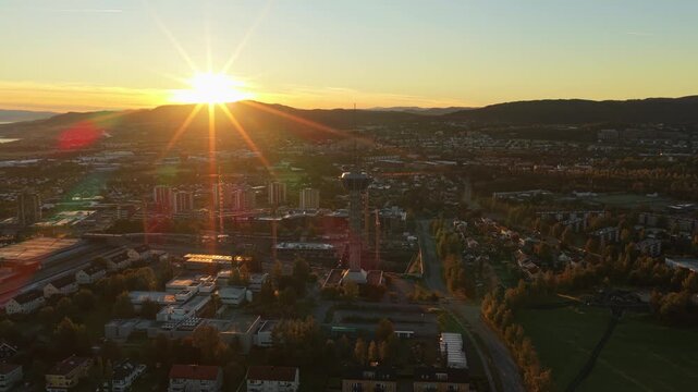 Aerial panorama of Tyholt Tower at sunrise in Trondheim, Norway