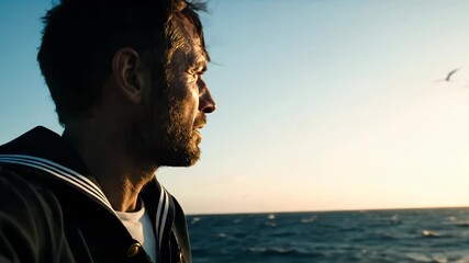 Caucasian man sailor looking at the sea during sunrise with seagull flying in the distance for adventure footage - Powered by Adobe