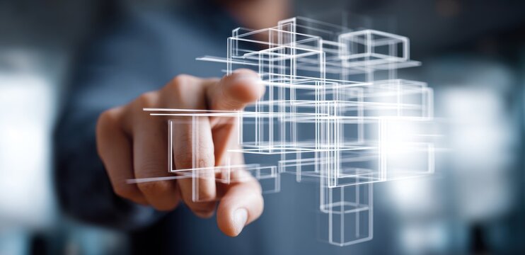 Finger interacting with glowing abstract wireframe structure in digital space.