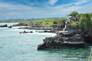 Batu Bolong Balenese Hindu temple beside the  Tanah Lot temple complex on the coast in the southwest of the Indonesian island of Bali