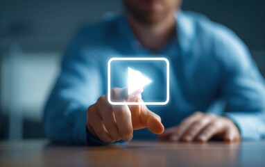Person touching glowing digital play button interface element