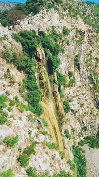 Ariel view of Waterfall
Water fall from the Mountains with green forest trees plants
Khyber Pakhtun Khawa, Northern area of Pakistan 