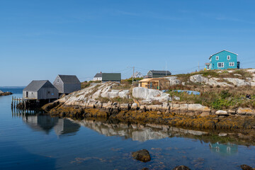 Peggys Cove, Canada - October 06, 2025: Picturesque fishing village on Nova Scotia’s coast, where colorful houses and boats reflect the charm of authentic maritime life.