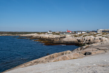 Peggys Cove, Canada - October 06, 2025: Picturesque fishing village on Nova Scotia’s coast, where colorful houses and boats reflect the charm of authentic maritime life.