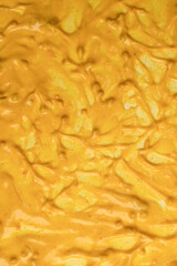 Yellow sauce splashes as a background.