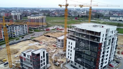 Aerial view of construction site with cranes and partially built modern apartment buildings - Powered by Adobe