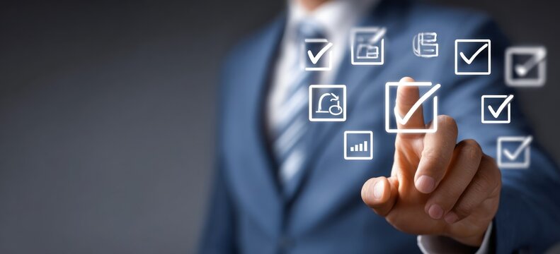 Businessman finger selecting a glowing checkmark icon on a screen.