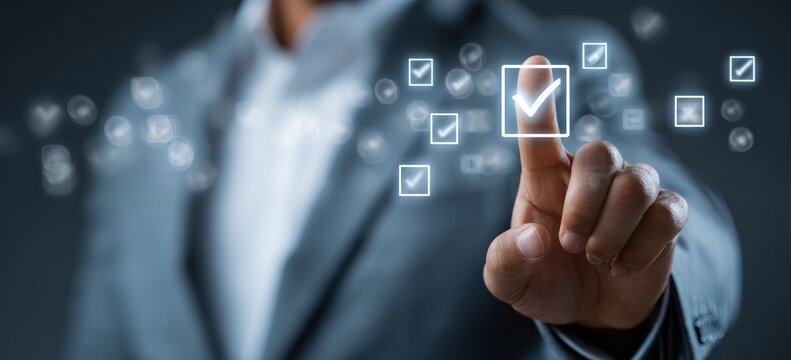 Finger selects glowing checkmark on dark digital interface background