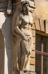Stoic Male Atlas on Facade