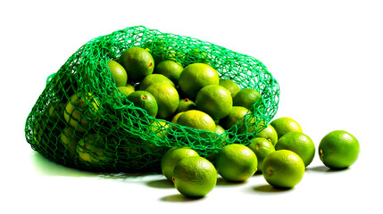 A green mesh bag filled with limes