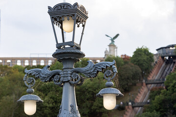 Hungary. Budapest. Spider web on the Szechenyi Bridge lamp.