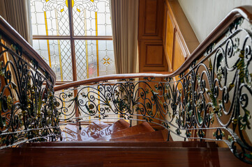 a teak wood stairs or staircase, Spiral teak steps inside a luxury house
