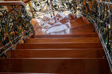 a teak wood stairs or staircase, Spiral teak steps inside a luxury house