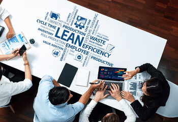 A diverse team collaborates in a modern office setting, focusing on lean efficiency and...