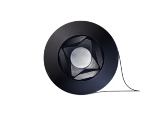 Close up abstract metallic iris diaphragm aperture mechanism with intricate blades and circular opening on black background