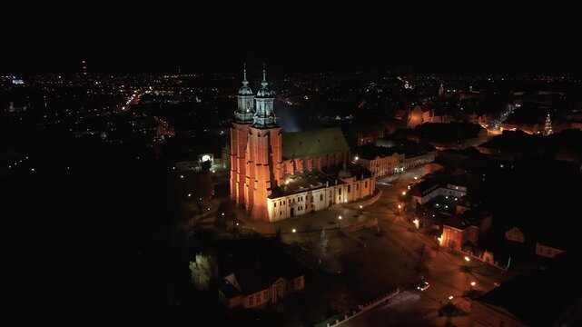 Aerial Gniezno Poland Archcathedral cityscape night 1. Since 1000 AD, main church of the Gniezno. Basilica of the Assumption of the Blessed Virgin Mary or the Sanctuary of St. Adalbert. 