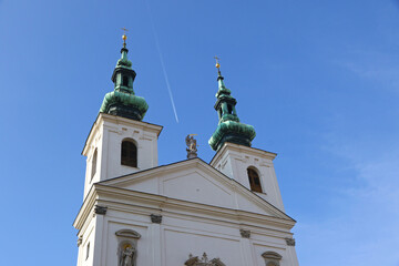 Facade of the Church of St. Michael the Archangel (Czech: Kostel svateho Michaela archandela). Roman Catholic church, located on Dominican Square next to the New Town Hall in Brno, Czechia