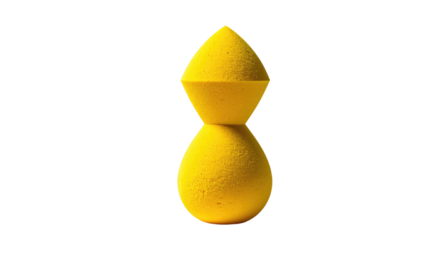 Abstract A bright yellow, hourglass-shaped sponge on black, featuring geometric shapes and textured surface - Powered by Adobe
