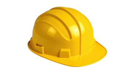 Yellow hard hat sits against black background. Protection for worker's head. Safety construction helmet