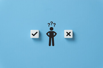 Decision making and choosing between the right and wrong. Confusion about to accept or to reject. Stickman with question mark standing in between the dice with check mark and x symbols