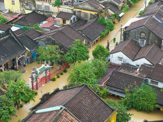 The deepest flood in history in Hoi An, Da Nang 2025. Aerial view of flooded ancient Asian town...