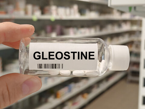Box of GLEOSTINE tablets on a hospital pharmacy table used to treat brain tumors and Hodgkin lymphoma a nitrosourea chemotherapy.