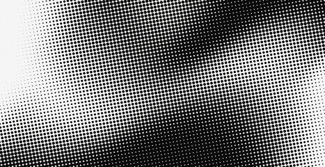 Vector illustration of a monochrome halftone background with a fading dot gradient effect. Retro pop-art pattern template ideal for graphic design, grunge texture overlay, or comic background.