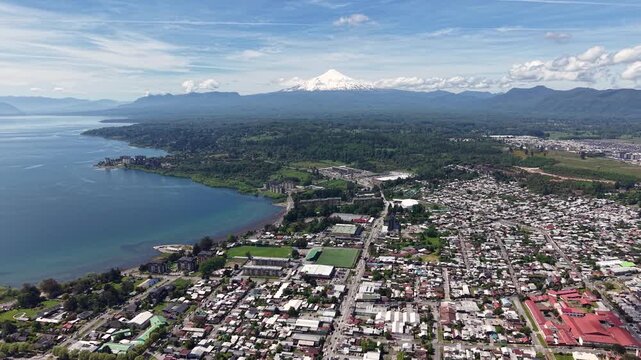 Aerial view of the city of Villarrica, Araucan&iacute;a, Chile. Villarrica volcano in the background.