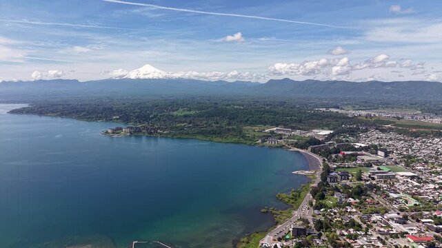 Aerial view of the city of Villarrica, Araucan&iacute;a, Chile. Villarrica volcano in the background.