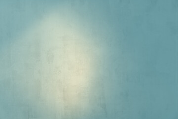 Light cast on a textured blue wall creates a serene atmosphere and calm feeling