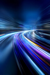 Abstract light trails create a dynamic motion effect on a dark background, showcasing vibrant colors and energy in a modern urban environment, emphasizing speed and movement