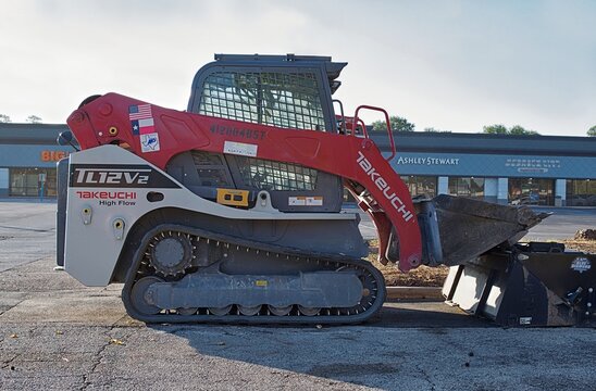 Takeuchi compact track loader skid steer parked side view Houston, Texas USA 10-21-2022.