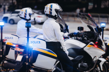Korean traffic police squad formation on the road, riding bike and motorcycle, highway patrol maintain public order in the city streets of Seoul, South Korea, policemen motorbikes with sirens pursuit