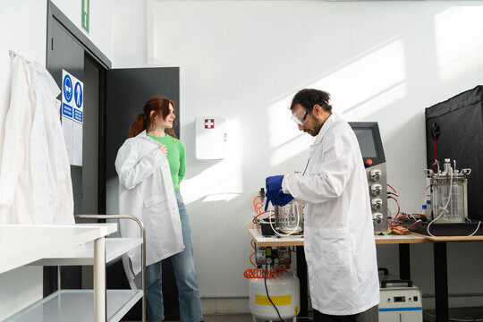 scientists working in biotech laboratory