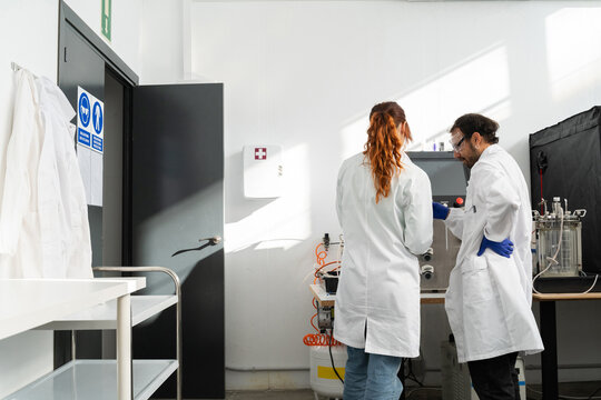 scientists working in biotech laboratory