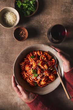 Fusilli Pasta in Red Sauce - being served