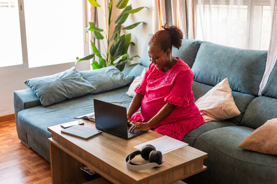 a pregnant woman at home