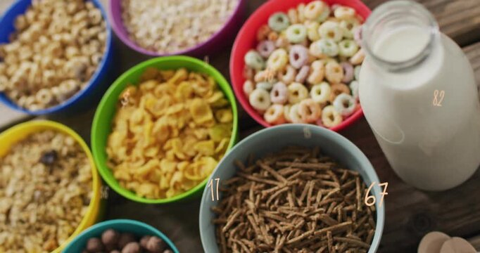 Fading numeric graphics initiating focus drifting on cereal bowls milk bottle visualizing data