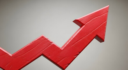 Red zigzag arrow pointing upward, symbolizing growth, success, and positive trend on a grey background.