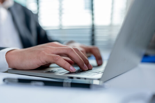 Close up hands of businessman people working in the office workplace. 