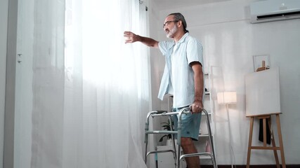 An elderly man with weak legs and is practicing walking with a walker. - Powered by Adobe