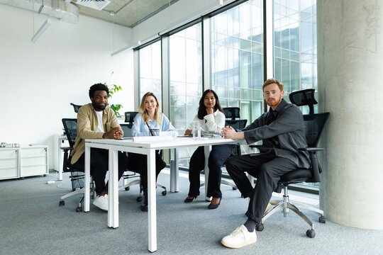 Portrait of confident multiethnic architects looking at camera