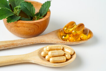 Medicine herbal organic capsule vitamin E omega 3 fish oil drug herbs leaf natural supplements