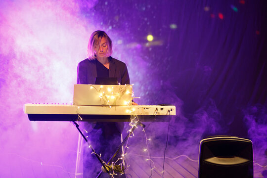 Pianist performs at an evening festival