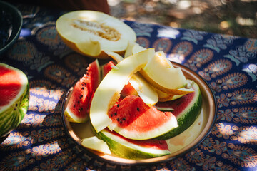 Fresh watermelon sliced on sunny terrace
