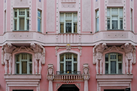 Pink Facade with Ornate Windows in Prague