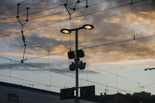 Train station lights at sunset