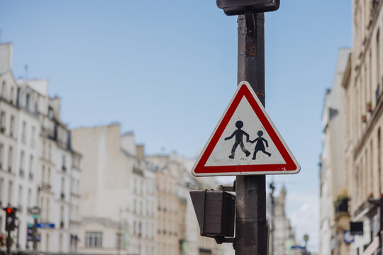 School crossing sign in city street